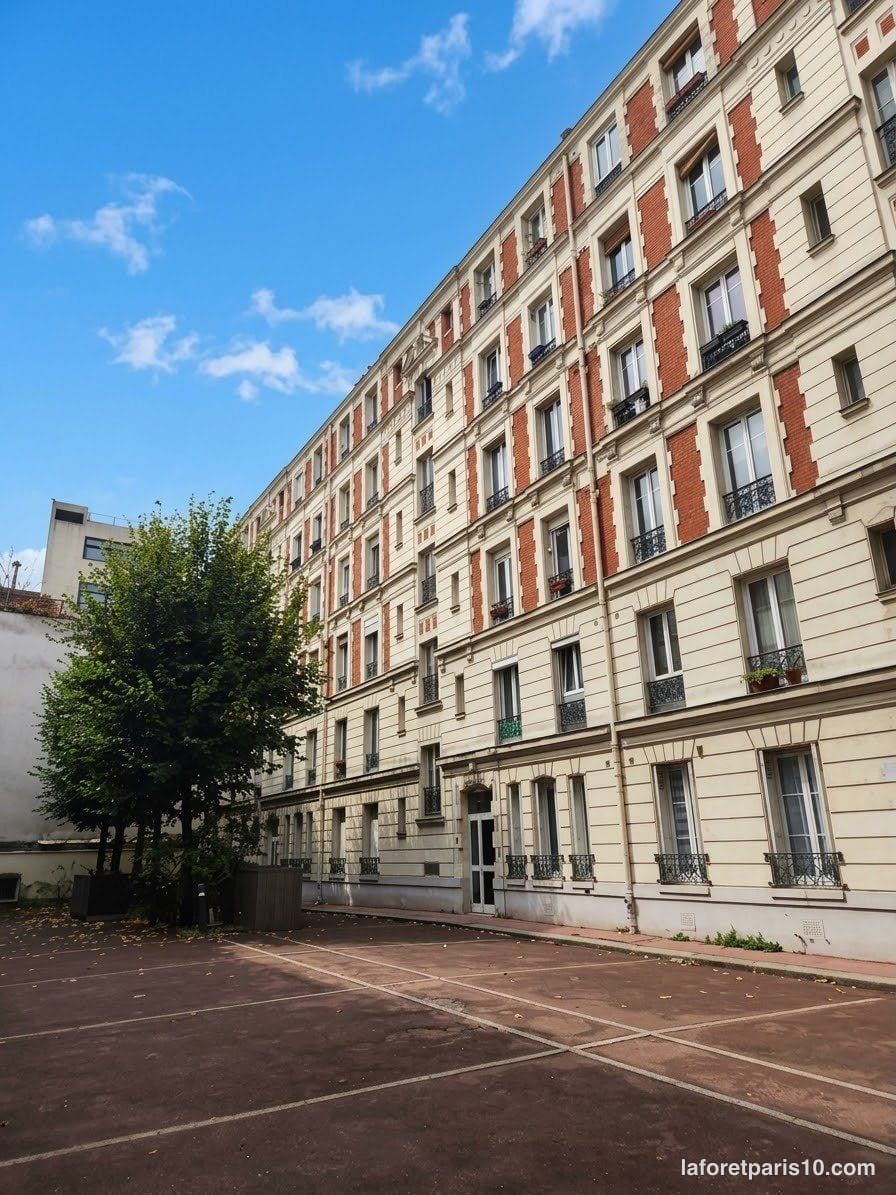 You are currently viewing 132 avenue Jean Jaurès, Paris 19e — immeuble de 1939 en brique et pierre